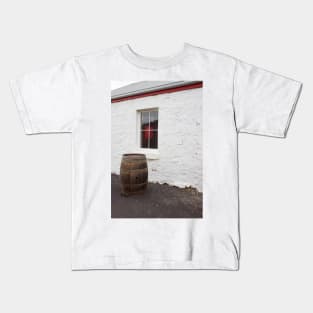 Wine barrel in front of window. Kids T-Shirt